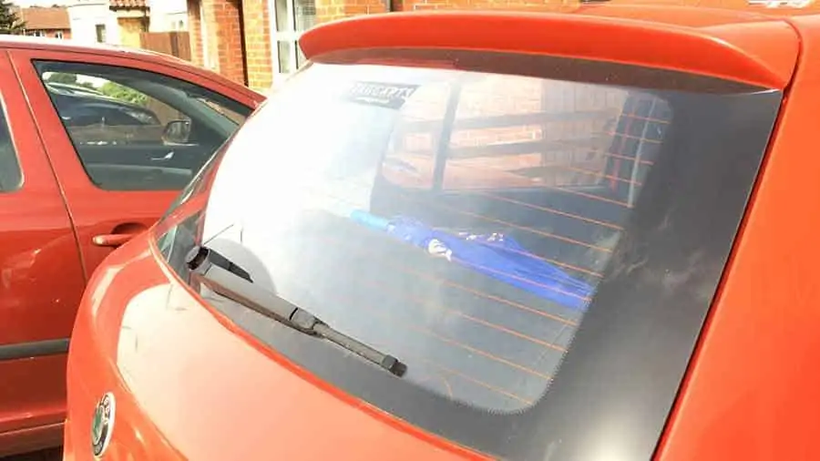Remove glare from video clips - Example of suns glare on motor car rear window and trunk