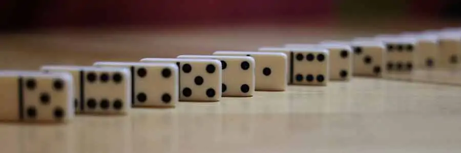 Depth of field examples. Dominoes spaced at 2cm intervals shot with a 70mm focal length lens at f-stop of f/4. Now the foreground and background dominoes appear to be out of focus