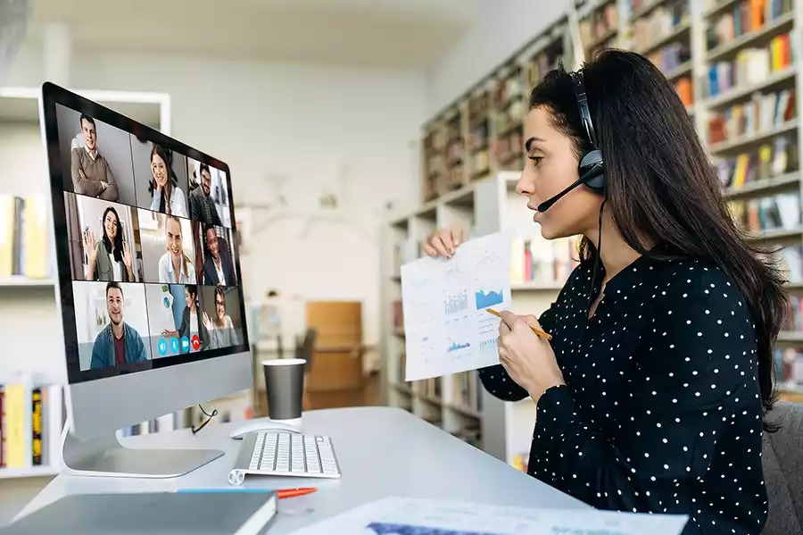 Lady leading a Zoom meeting