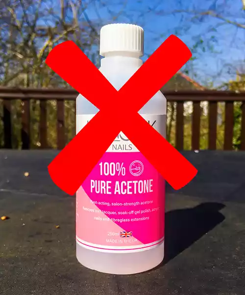 Bottle of acetone with cross