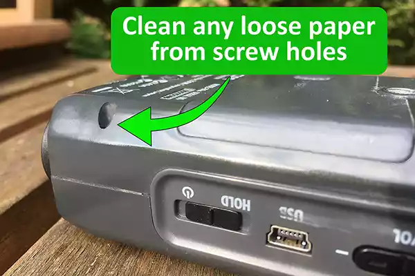 Cleaning paper from screw holes