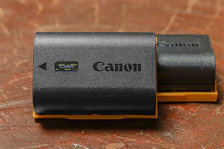 A pair of Canon LP-E6NH camera batteries