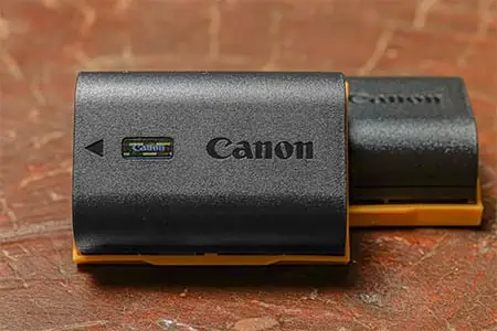 A pair of Canon LP-E6NH camera batteries