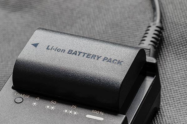 A third-party Li-Ion camera battery for a Canon EOS R series mirrorless camera