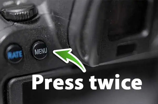 Menu button on Canon EOS R6 with text indicating to press the button twice