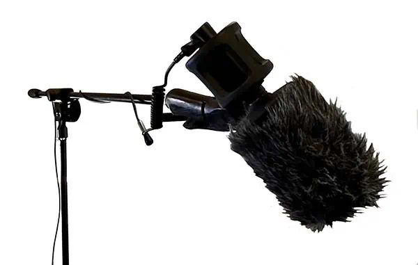 Shotgun microphone on a boom arm