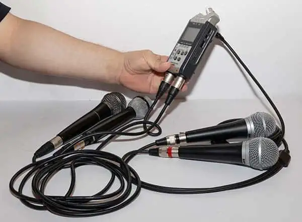 4 XLR mics connected to Zoom H4n recorder