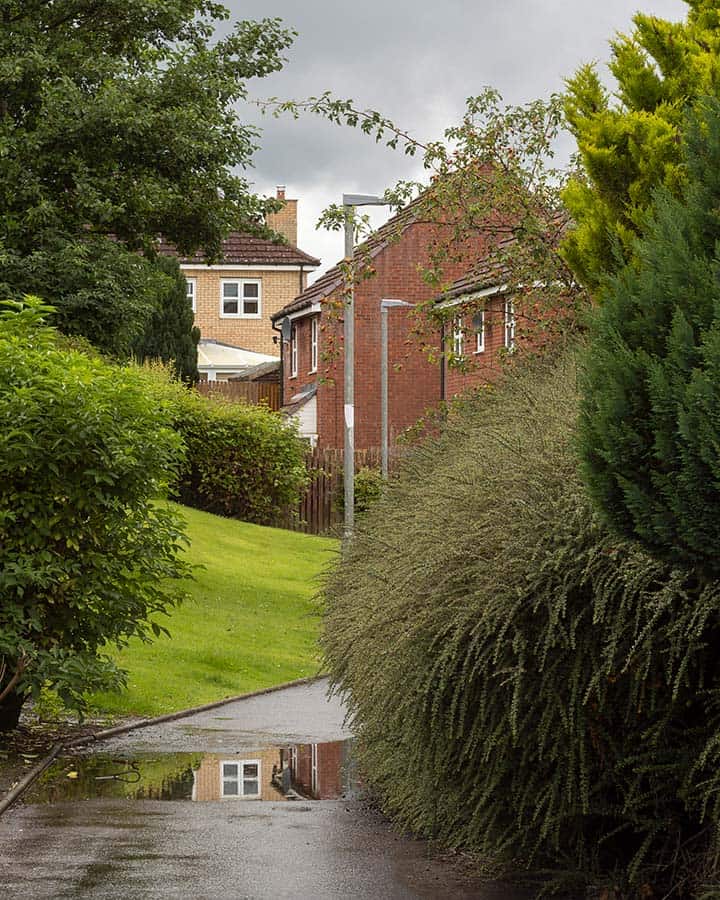 View along a village foopath shot with a Helios-44M at f11 on a Canon R6 mirrorless camera