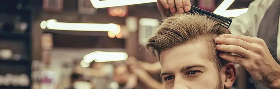 Man having a hair cut and styling